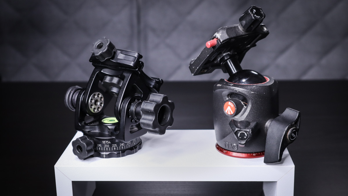 A geared tripod head and ball head shown side by side